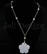 Luxe Fowerchelles with pearls necklace